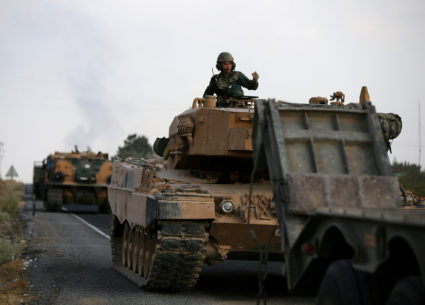 Turkish army vehicles on October 18, 2019, are moving on a road near the Turkish border town of Ceylanpinar, Sanliurfa province, Turkey. File photo by Stoyan Nenov/Reuters