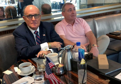 U.S. President Donald Trump's personal lawyer Rudy Giuliani has coffee with Ukrainian-American businessman Lev Parnas at the Trump International Hotel in Washington, U.S. September 20, 2019. Photo by REUTERS/Aram Roston/File Photo
