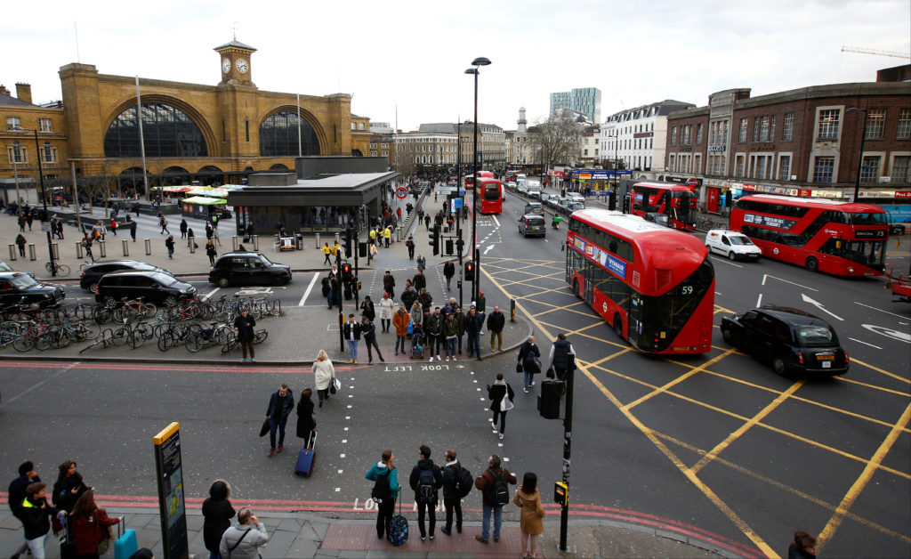 Pedestrians and traffic go past London King's Cross railway station, London, Britain, January 26, 2018. REUTERS/Peter Czib...