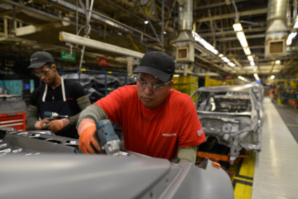 Line workers install the trunk on the flex line at Nissan Motor Co's automobile manufacturing plant in Smyrna, Tennessee, U.S., August 23, 2018. Picture taken August 23, 2018. Photo by William DeShazer/Reuters