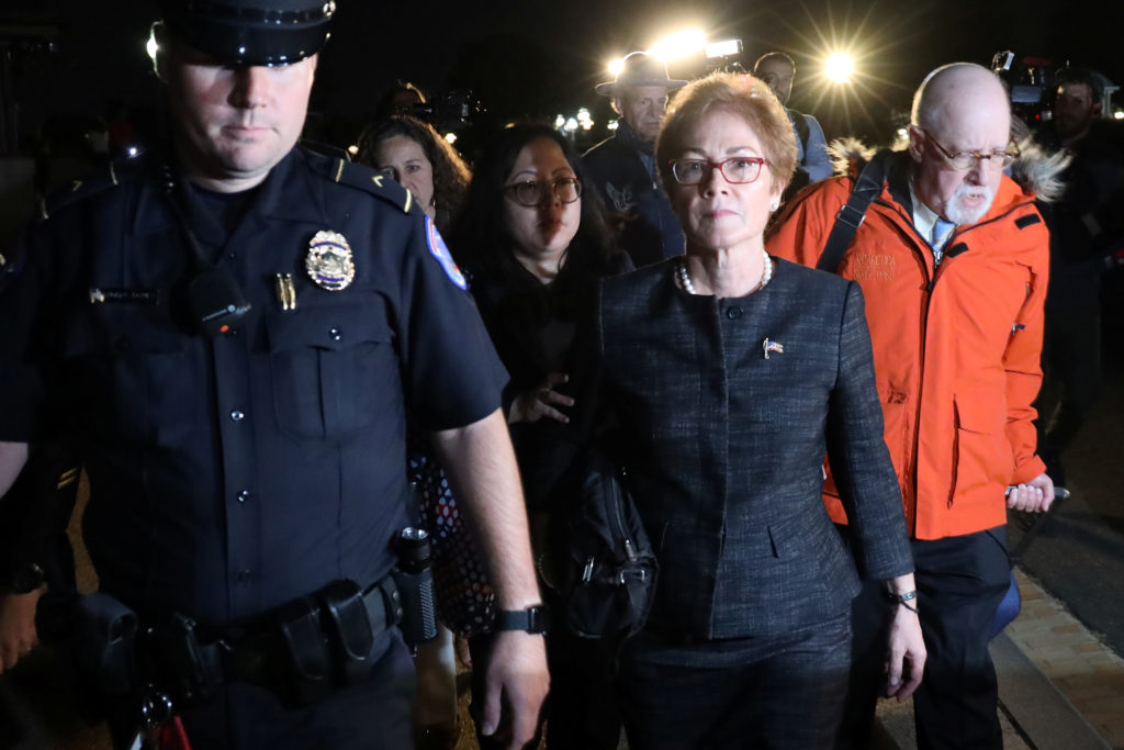 U.S. Capitol Police guide former U.S. ambassador to Ukraine Marie Yovanovitch as she departs after testifying in the U.S. ...