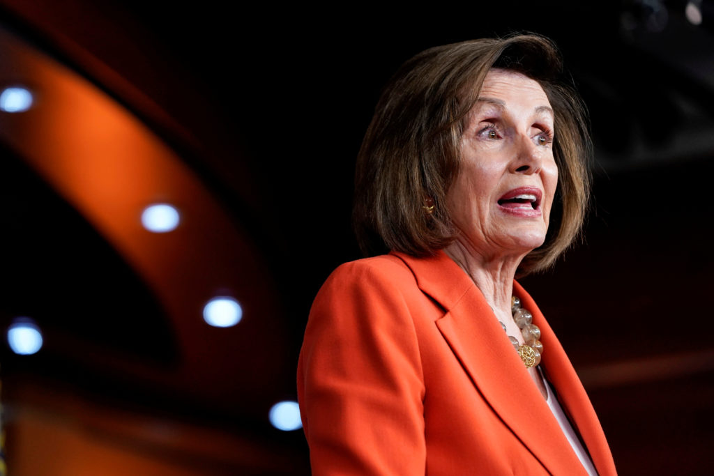 FILE PHOTO: Speaker of the House Nancy Pelosi (D-CA) speaks during a media briefing ahead of a House vote authorizing an i...
