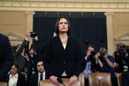 Fiona Hill, former senior director for Europe and Russia on the National Security Council, takes her seat before she and David Holmes, political counselor at the U.S Embassy in Kiev, testify to a House Intelligence Committee hearing as part of the impeachment inquiry into U.S. President Donald Trump on Capitol Hill in Washington, U.S., November 21, 2019. REUTERS/Loren Elliott TPX IMAGES OF THE DAY