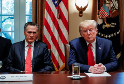 U.S. President Donald Trump listens to U.S. Senator Mitt Romney (R-UT) during a listening session on the regulation of nicotine vaping and e-cigarettes in the Cabinet Room of the White House in Washington, U.S., November 22, 2019. Photo by Tom Brenner/Reuters