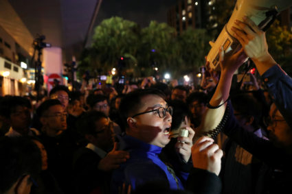 A pro-democratic district councilor-elect addresses pro-democracy protesters outside the Polytechnic University (PolyU) in Hong Kong, China, November 25, 2019. REUTERS/Leah Millis