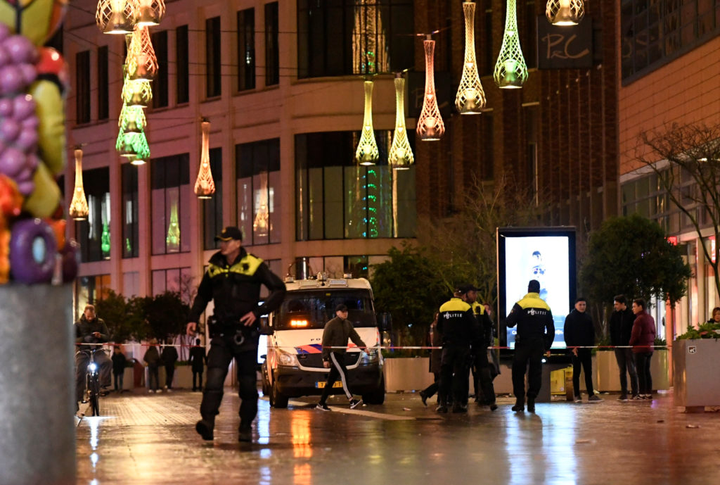 Police officers work near the site of a stabbing on a shopping street in The Hague, Netherlands November 29, 2019. Photo b...