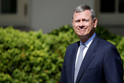 FILE PHOTO: U.S. Supreme Court Chief Justice John Roberts arrives for the swearing in ceremony of Judge Neil Gorsuch as an Associate Supreme Court Justice in the Rose Garden of the White House in Washington, U.S., April 10, 2017. Photo by Joshua Roberts/Reuters