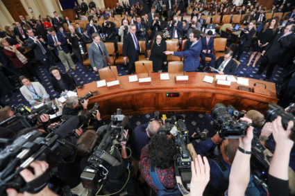 Witnesses arrive prior to the start of a House Judiciary Committee hearing on the impeachment inquiry into U.S. President Donald Trump on Capitol Hill in Washington, U.S., December 4, 2019. REUTERS/Loren Elliott