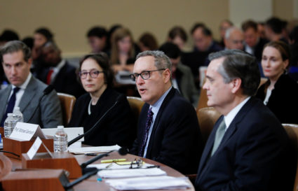 Michael Gerhardt, professor of law at University of North Carolina School of Law, testifies as he sits among fellow witnesses Noah Feldman, professor of law at Harvard University Law School, Pamela Karlan, co-director of the Supreme Court Litigation Clinic at Stanford University Law School and Jonathan Turley, professor of law at George Washington University Law School, during the first House Judiciary Committee hearing on the impeachment inquiry into U.S. President Donald Trump on Capitol Hill in Washington, U.S., December 4, 2019. REUTERS/Mike Segar