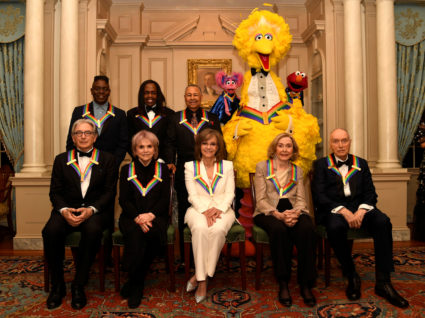 2019 Kennedy Center Honorees gather for a group photo (seated, L-R) conductor Michael Tilson Thomas, singer Linda Ronstadt, actress Sally Field, Sesame Street co-founders Joan Ganz Cooney and Dr. Lloyd Morrisette, (standing, L-R) Earth,Wind &amp; Fire band members Philip Bailey, Verdine White and Ralph Johnson and Sesame Street characters Abby, Big Bird and Elmo, after a gala dinner at the U.S. State Department, in Washington, U.S., December 7, 2019. REUTERS/Mike Theiler