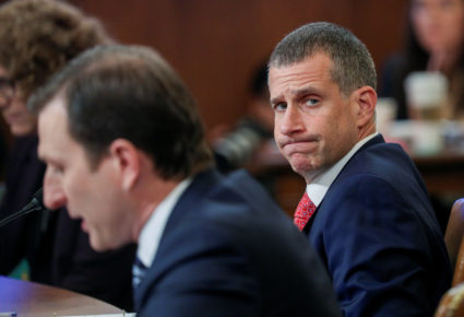 Republican staff counsel Stephen Castor listens as Democratic staff attorney Daniel Goldman speaks during a House Judiciary Committee hearing to receive counsel presentations of evidence on the impeachment inquiry into U.S. President Donald Trump on Capitol Hill in Washington, U.S., December 9, 2019. REUTERS/Loren Elliott