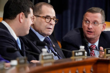 Rep. Doug Collins (R-GA) speaks with Chairman of the House Judiciary Committee Jerrold Nadler (R-NY) during opening statements as the House Judiciary Committee begins its markup of articles of impeachment against U.S. President Donald Trump on Capitol Hill in Washington, U.S., December 11, 2019. REUTERS/Joshua Roberts