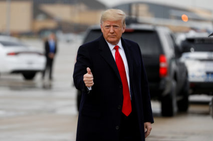 U.S. President Donald Trump gestures as he arrives to board Air Force One at Joint Base Andrews, Maryland, U.S., December 14, 2019. Photo by Tom Brenner/Reuters