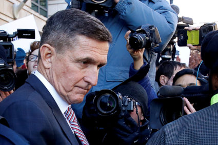 Former U.S. national security adviser Michael Flynn passes by members of the media as he departs after his sentencing was delayed at U.S. District Court in Washington, on Dec. 18, 2018. Photo by REUTERS/Joshua Roberts