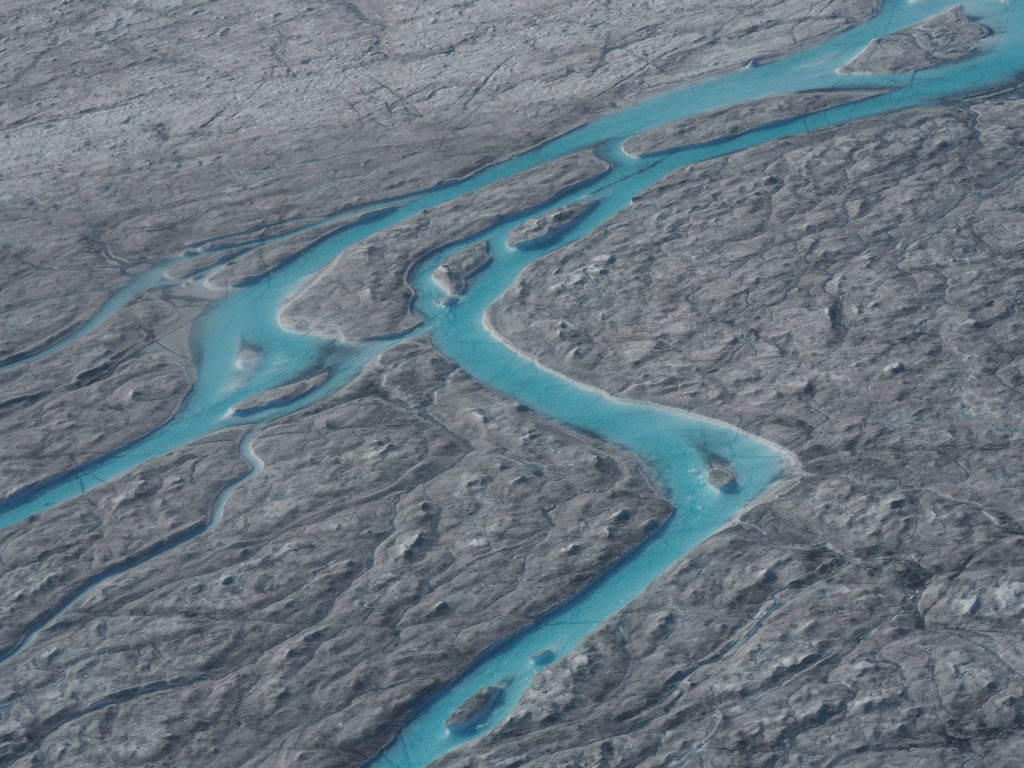 A view of ice melting during a heatwave in Kangerlussuaq, Greenland is seen in this August 1, 2019 image obtained via soci...