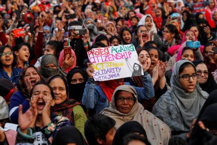 Demonstrators attend a protest against a new citizenship law in India, outside the Jamia Millia Islamia university in New Delhi on December 22. Photo by Danish Siddiqui/Reuters