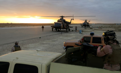 Iraqi Air Force helicopters land at Ain al-Asad airbase in the Anbar province, Iraq, on December 29, 2019. Photo by Thaier Al-Sudani/Reuters
