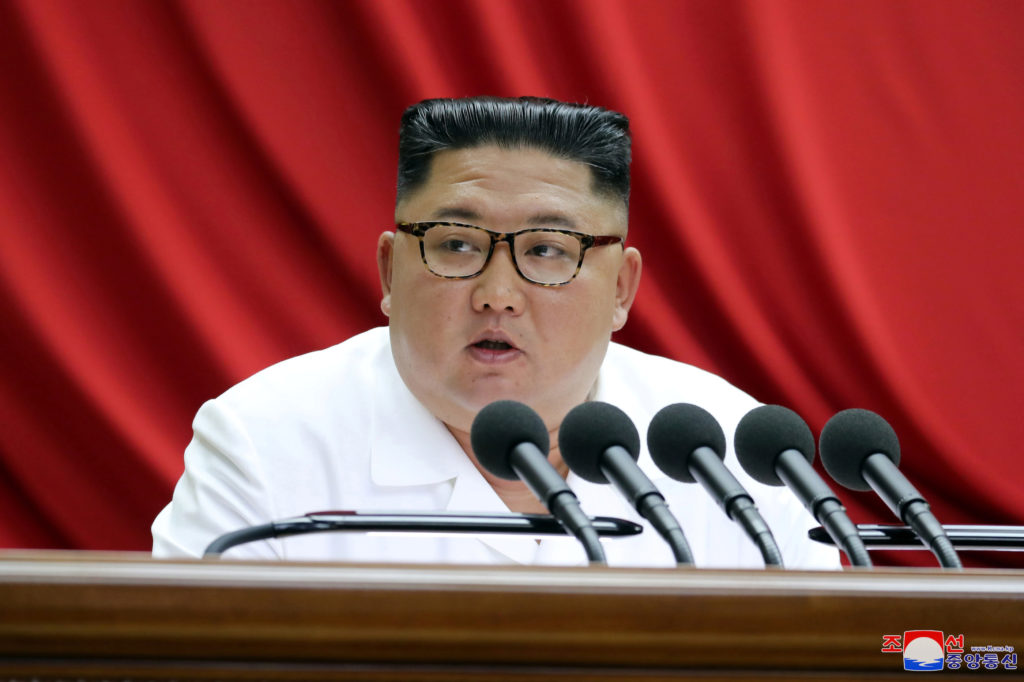 North Korean leader Kim Jong Un speaks during the 5th Plenary Meeting of the 7th Central Committee of the Workers' Party o...