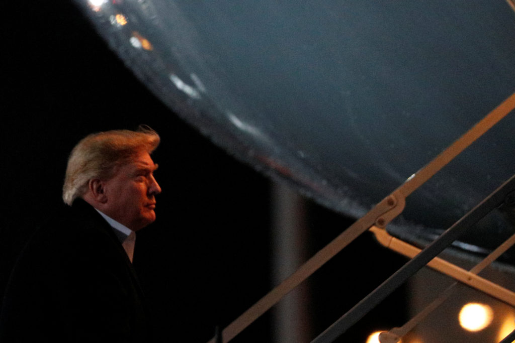 President Donald Trump boarding Air Force One at Ramstein Air Base in Germany on November 29, 2019. Photo by Tom Brenner/R...