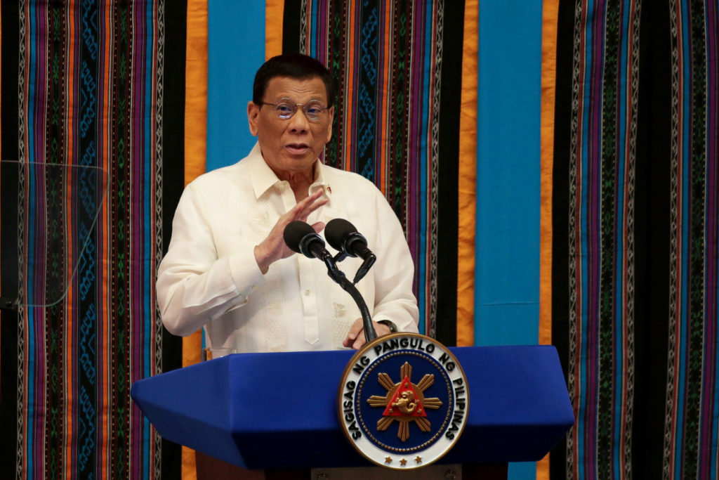 Philippine President Rodrigo Duterte gestures during his fourth State of the Nation Address at the Philippine Congress in ...