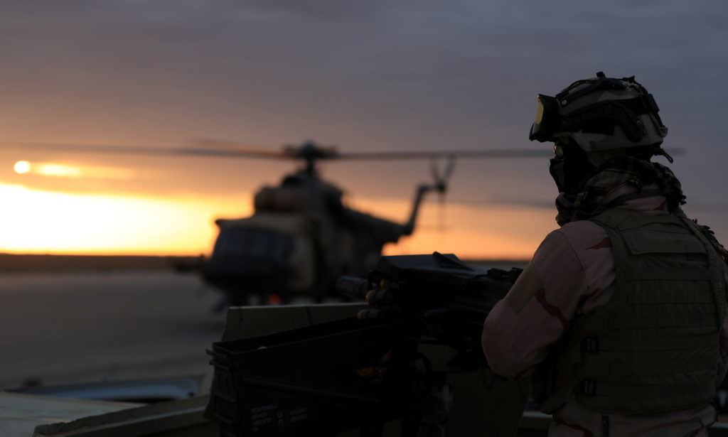 FILE PHOTO: A member of Iraqi security forces is seen at Ain al-Asad airbase in the Anbar province, Iraq December 29, 2019...