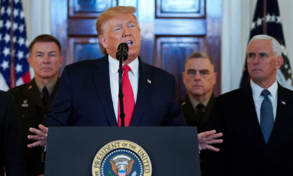 President Donald Trump delivers a statement about Iran flanked by U.S. Army Chief of Staff General James McConville, Chairman of the Joint Chiefs of Staff Army General Mark Milley and Vice President Mike Pence in the Grand Foyer at the White House on Jan. 8, 2020. Photo by REUTERS/Kevin Lamarque