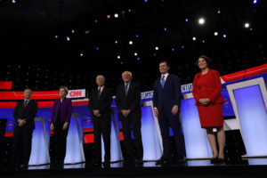 Democratic 2020 U.S. presidential candidates (L-R) billionaire activist Tom Steyer, Senator Elizabeth Warren (D-MA), former Vice President Joe Biden, Senator Bernie Sanders (I-VT), former South Bend Mayor Pete Buttigieg and Senator Amy Klobuchar (D-MN) take the stage for the seventh Democratic 2020 presidential debate at Drake University in Des Moines, Iowa, U.S., January 14, 2020. REUTERS/Brenna Norman