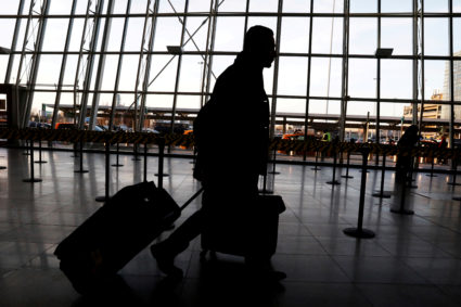 FILE PHOTO: International travelers arrive at John F. Kennedy international airport in New York City, U.S., February 4, 2017. Photo by Brendan McDermid/File Photo