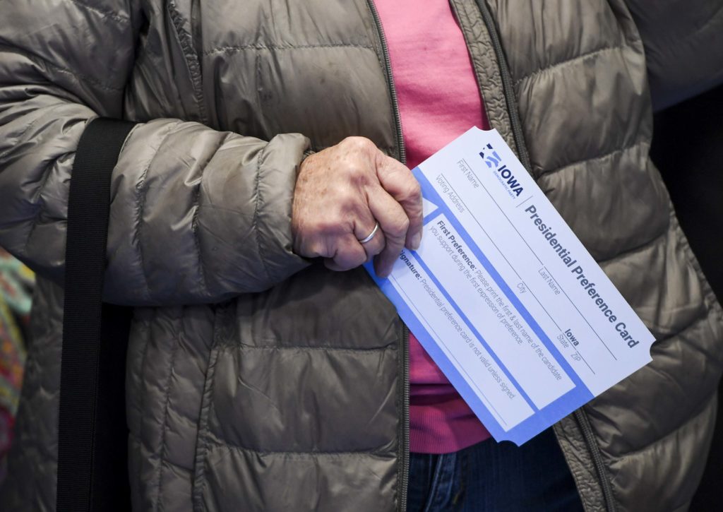 Feb 3, 2020; Larchwood, Iowa, USA; A caucus-goer holds a presidential preference card during the Democratic presidential c...