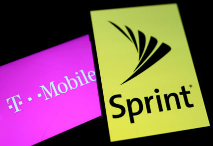 FILE PHOTO: Smartphones with the logos of T-Mobile and Sprint are seen in this illustration taken September 19, 2017. REUTERS/Dado Ruvic/Illustration/File Photo
