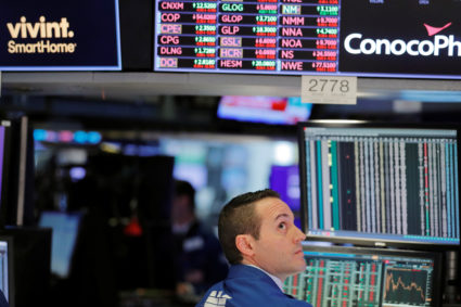 A trader works on the floor of the New York Stock Exchange shortly after the closing bell as the market takes a significant dip in New York, U.S., February 25, 2020. Photo by Lucas Jackson/REUTERS