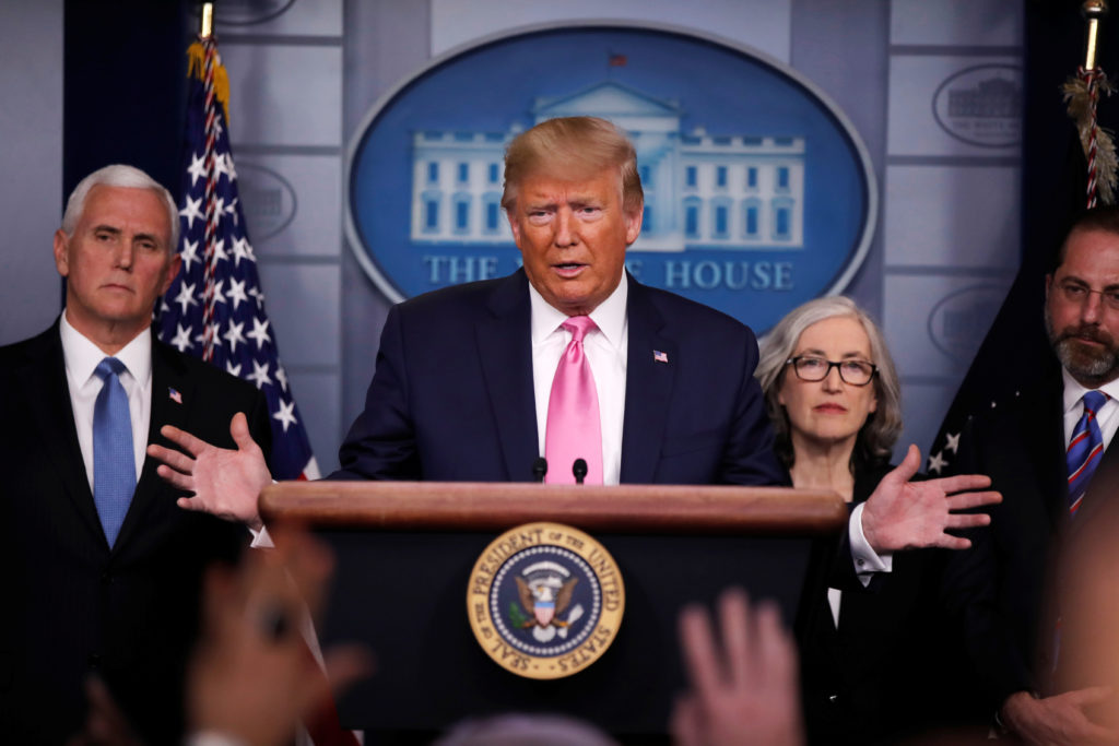 U.S. President Donald Trump answers a question during a news conference on the coronavirus outbreak at the White House in ...
