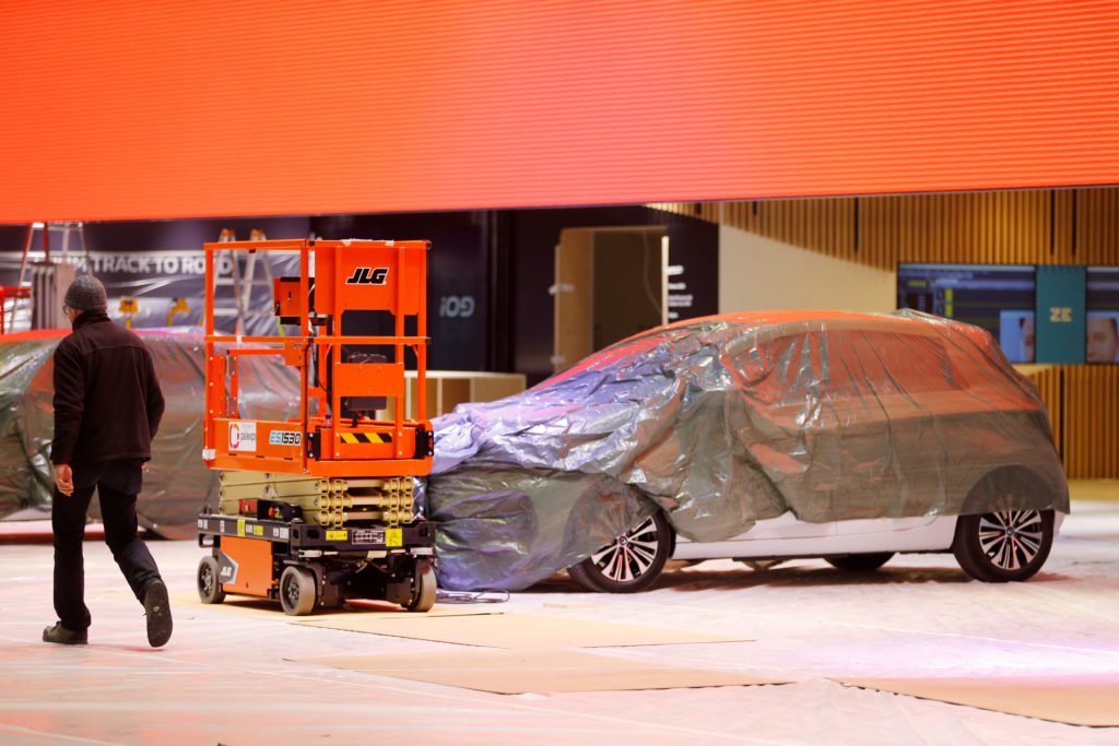 A covered car is pictured at the Palexpo exhibition centre as the 90th edition of the International Motor Show is cancelle...