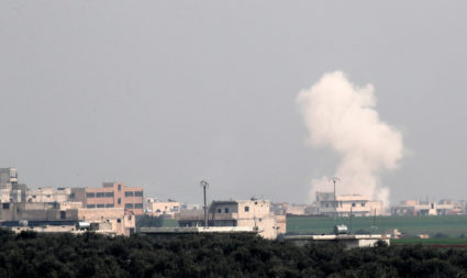 Smoke rises after an air strike in Saraqeb in Idlib province, Syria on February 28, 2020. Photo by Umit Bektas/Reuters