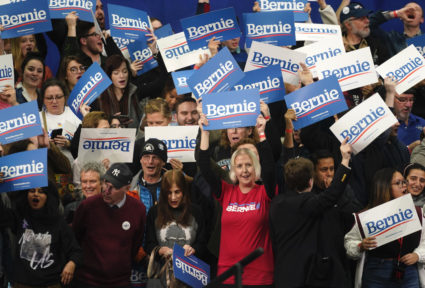 Supporters of Democratic U.S. presidential candidate Senator Bernie Sanders cheer at his New Hampshire primary night rally in Manchester, N.H., U.S., February 11, 2020. REUTERS/Rick Wilking