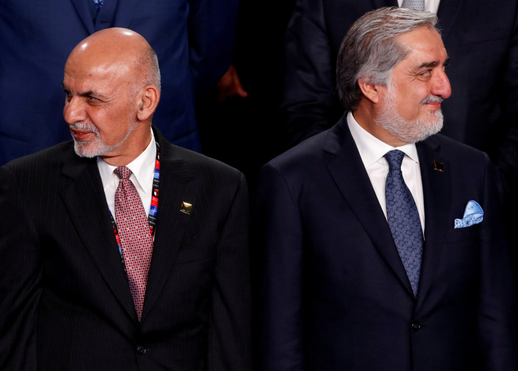 FILE PHOTO: Afghanistan's President Ashraf Ghani (L) and Afghanistan's Chief Executive Abdullah Abdullah (R) participate i...