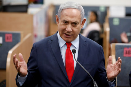 Israeli Prime Minister Benjamin Netanyahu gestures as he delivers a statement during his visit at the Health Ministry national hotline, in Kiryat Malachi, Israel March 1, 2020. Photo by Amir Cohen/REUTERS
