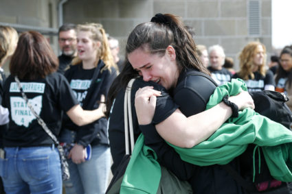 Americans adjust to new life, hunker down amid virus