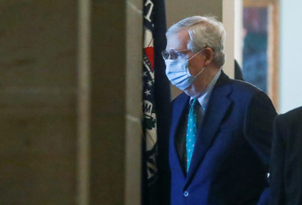 U.S. Senate Majority Leader Mitch McConnell (R-KY) wears a protective mask as he arrives at his office inside the U.S. Capitol after senators returned to Capitol Hill amid concerns that their legislative sessions could put lawmakers and staff at risk of contracting the coronavirus in Washington, U.S., May 4, 2020. Photo by REUTERS/Leah Millis