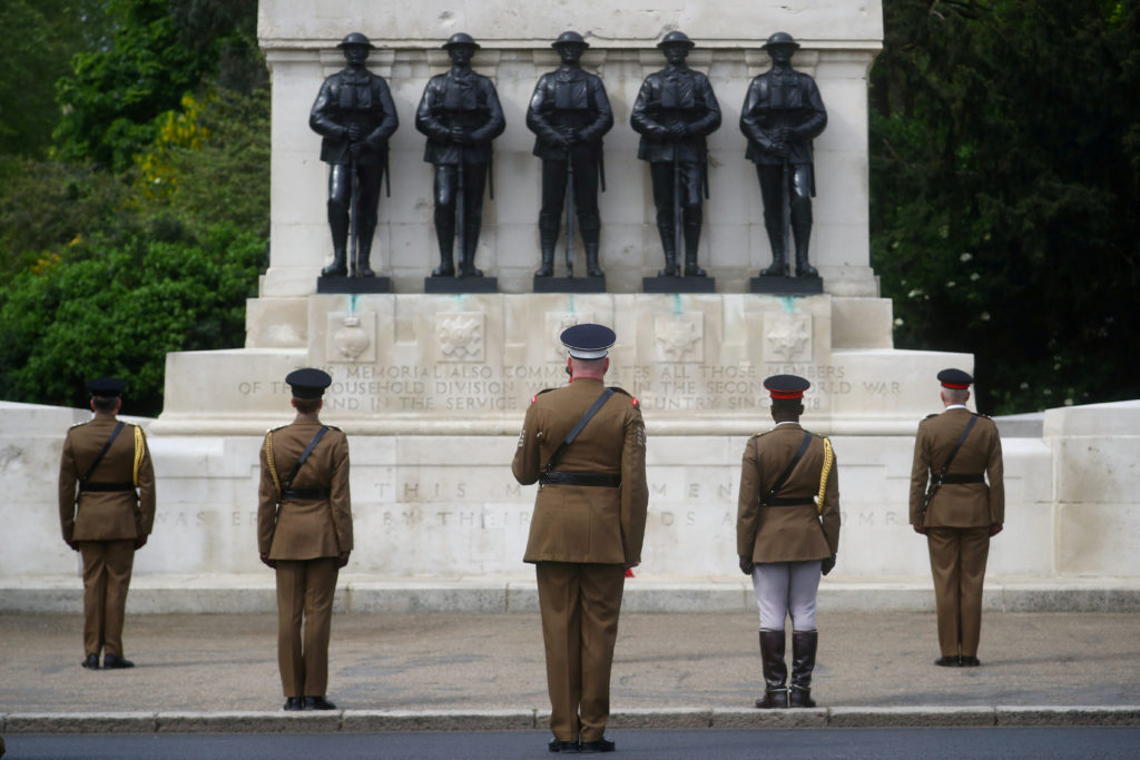 Senior officers and soldiers of the Household Division stand in front of Guards Memorial in St James's Park during a two m...