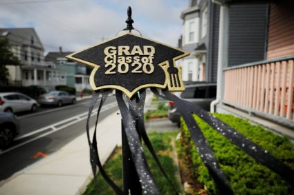 A graduation sign outside a home reads "Grad Class of 2020" as in-person high school and college graduations and commencements have been cancelled or postponed because of the coronavirus disease (COVID-19) outbreak in Somerville, Massachusetts, U.S., May 28, 2020. Photo by REUTERS/Brian Snyder