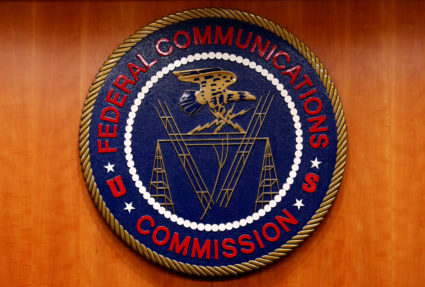 The Federal Communications Commission (FCC) logo seen before the FCC Net Neutrality hearing in Washington February 26, 2015. Photo by Yuri Gripas/REUTERS