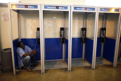 An inmate talks on the phone at San Quentin state prison in San Quentin, California, June 8, 2012. Photo by Lucy Nicholson/REUTERS