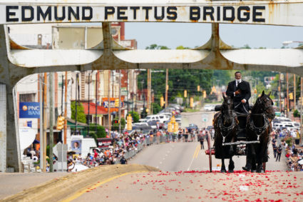 Body of civil rights icon John Lewis crosses Selma bridge