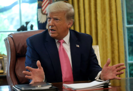 Trump announces return of coronavirus briefings amid 'big flare-up'