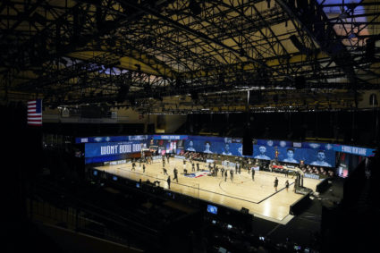 As NBA resumes play, questions linger about pro sports in a pandemic