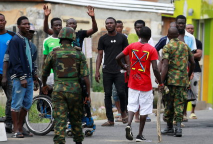 Nigerian president acknowledges 'many lives' lost but doesn't mention shootings by soldiers