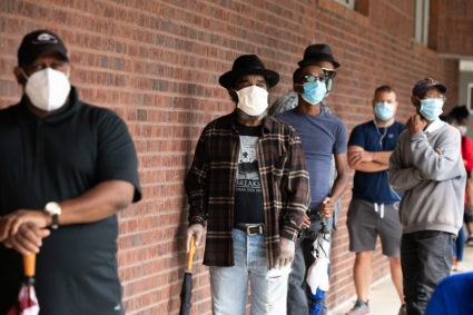 In a year of uncertainty, voters' fears of not being counted prompt record early turnout