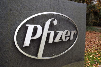 The Pfizer logo is seen at their UK commercial headquarters in Walton Oaks, Britain, November 11, 2020. Photo by Peter Cziborra/Reuters.
