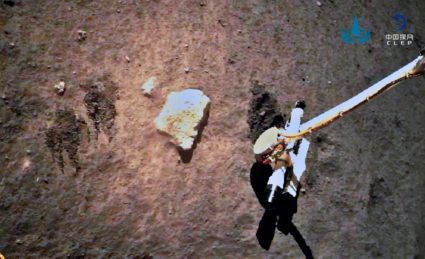 China's Chang'e-5 spacecraft collects lunar samples on the moon in this handout image provided by China National Space Administration (CNSA) December 3, 2020. Photo by CNSA/Handout via Reuters